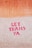 Pink graffiti text reading 'LEY TRANS YA' is painted onto a textured concrete surface. Above it, there is an orange tiled section.