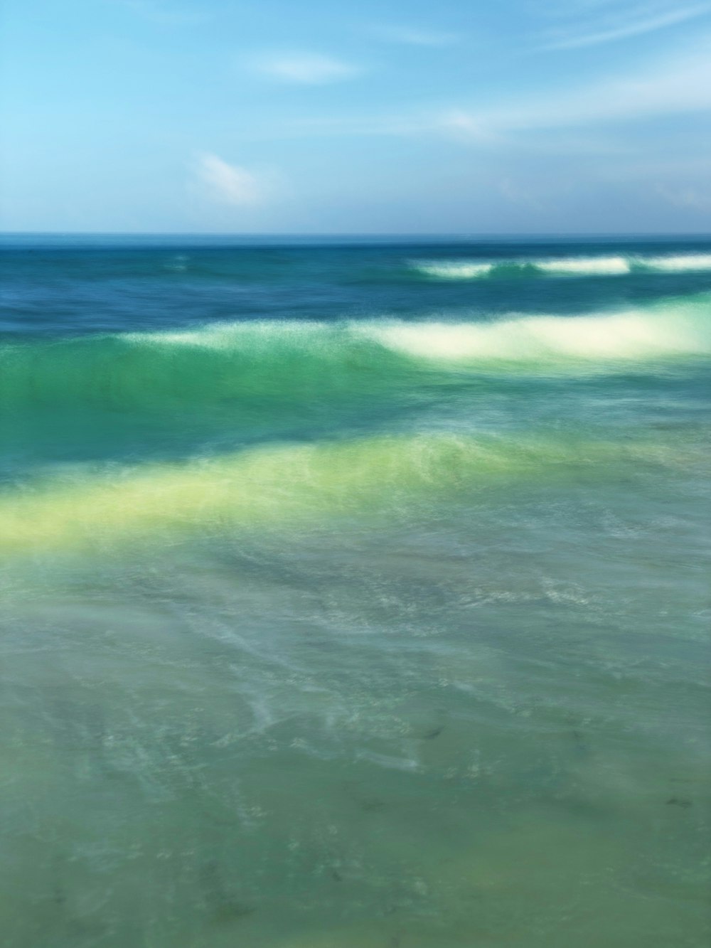 green and blue ocean waves