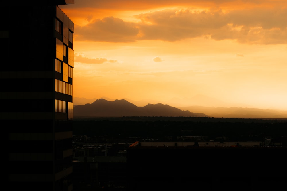 silhouette of building during sunset