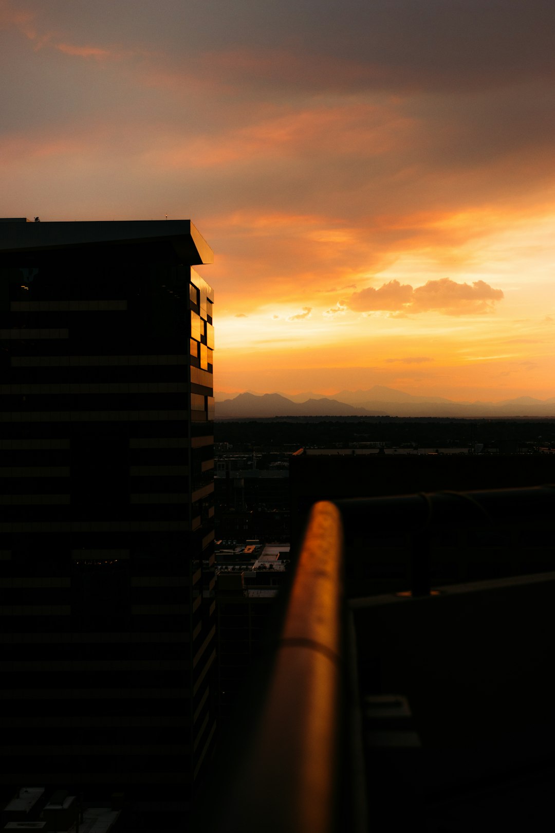 brown and white concrete building during sunset