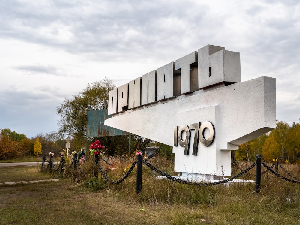 people standing near white concrete building during daytime