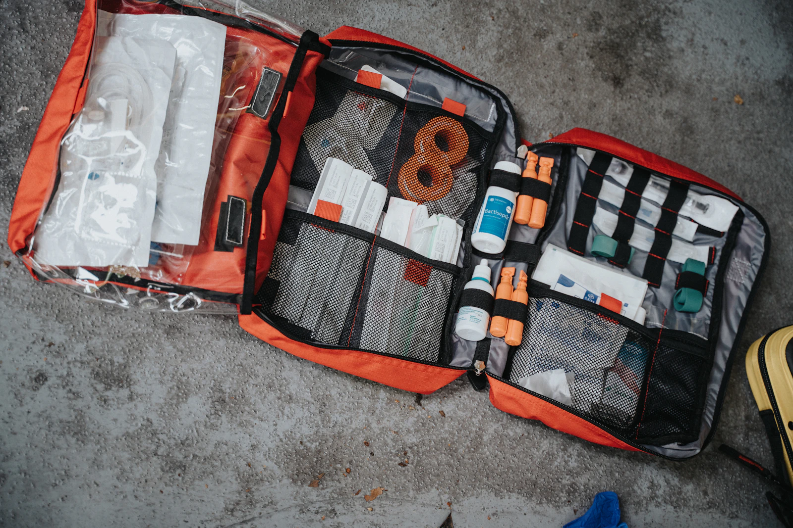 A packed emergency go-bag ready for a storm evacuation