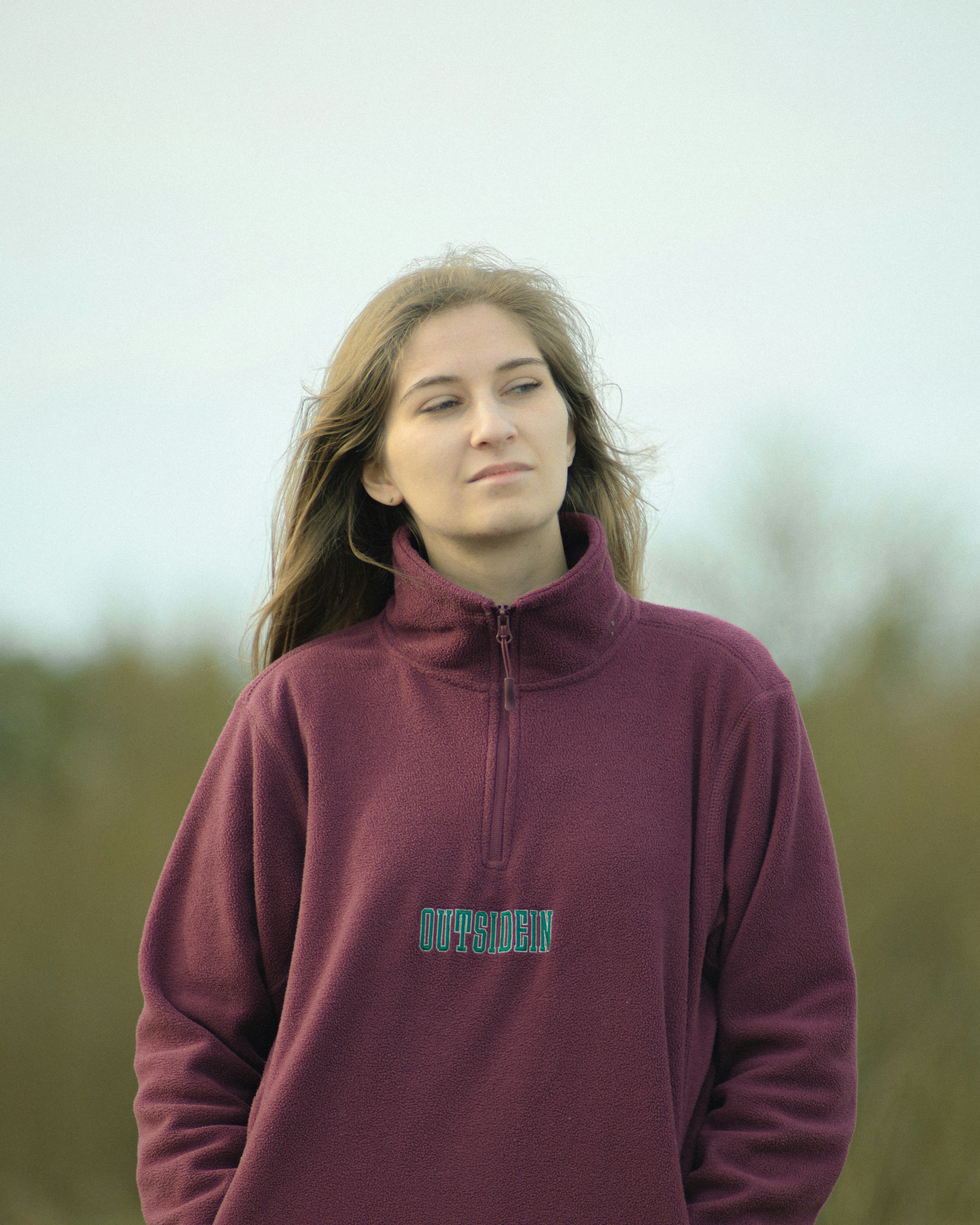 woman in pink pullover hoodie