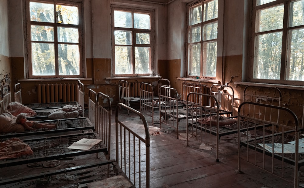 brown wooden chairs and tables in room