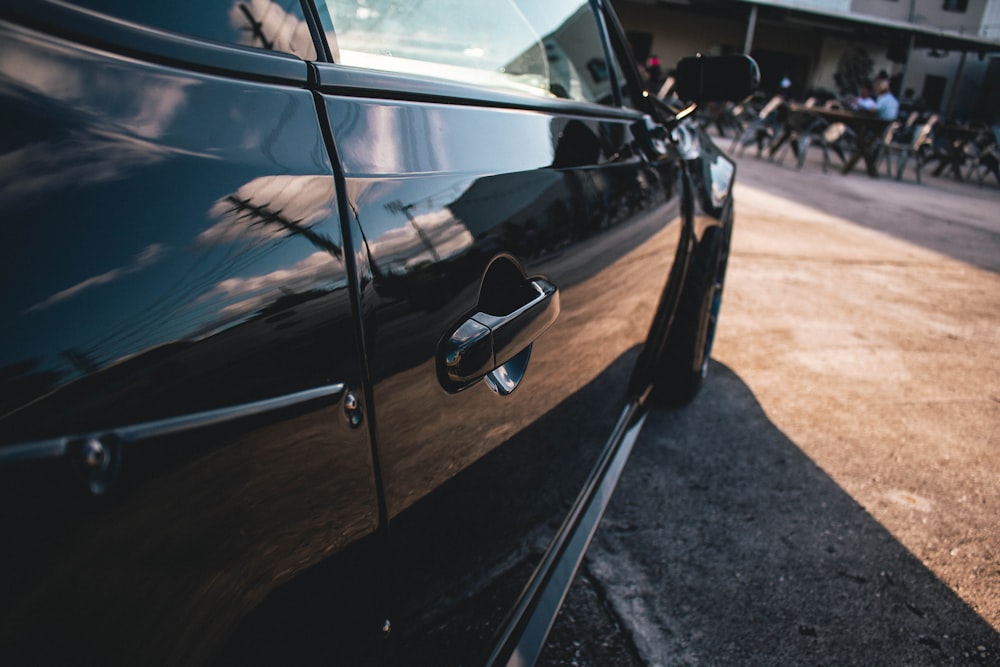 black car on road during daytime