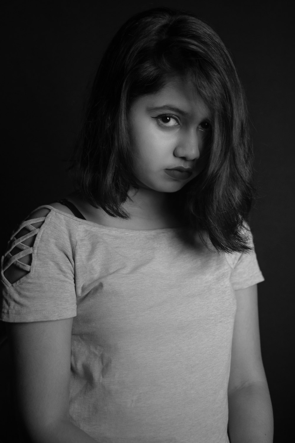 grayscale photo of girl in crew neck t-shirt
