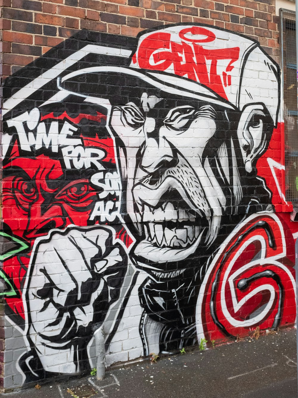 Grafitis rojos, blancos y negros