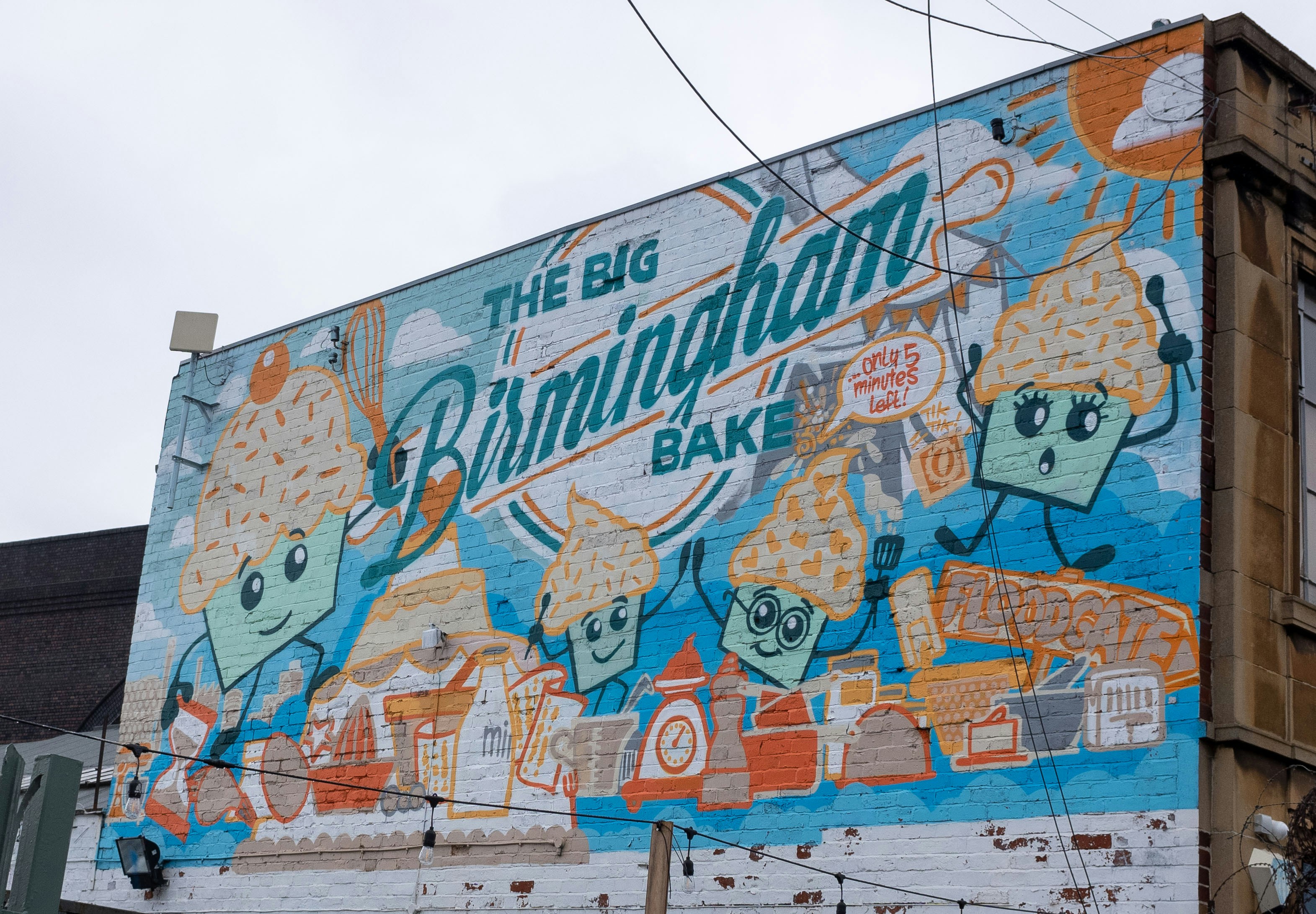 blue and brown graffiti on wall