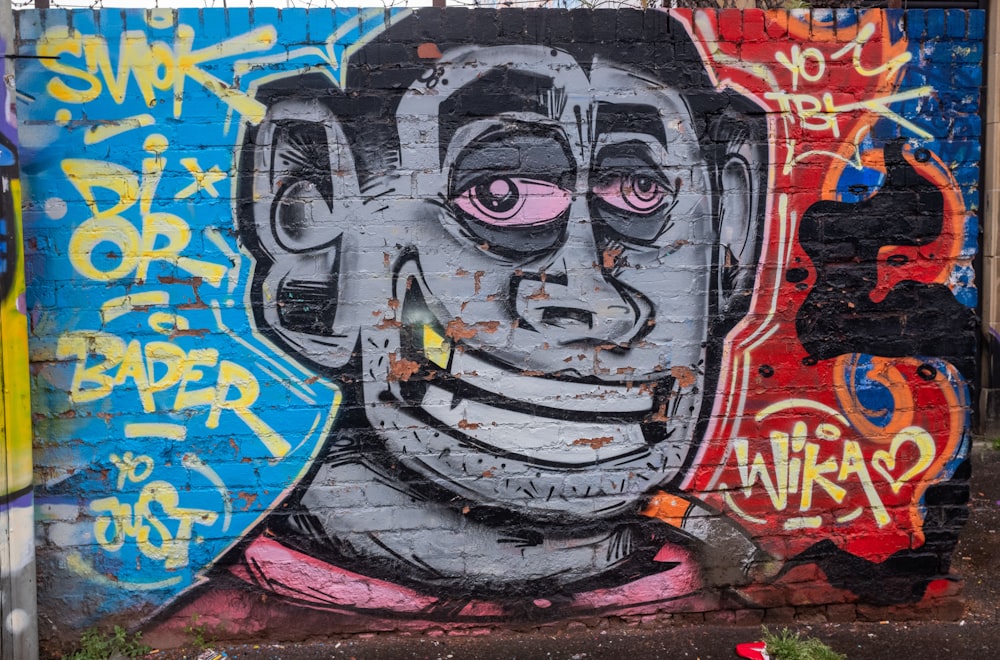 woman in red and black dress graffiti