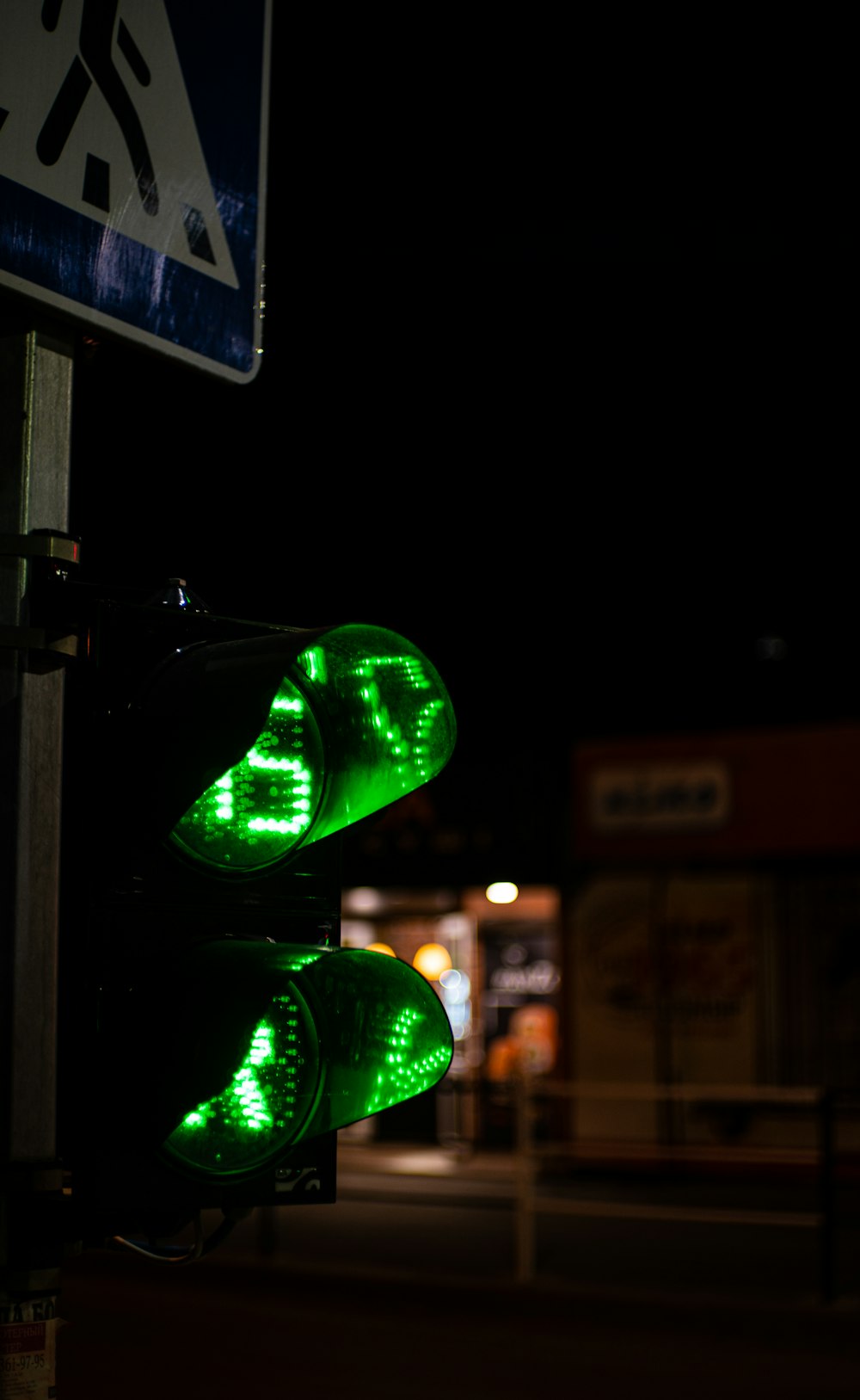 green traffic light during night time