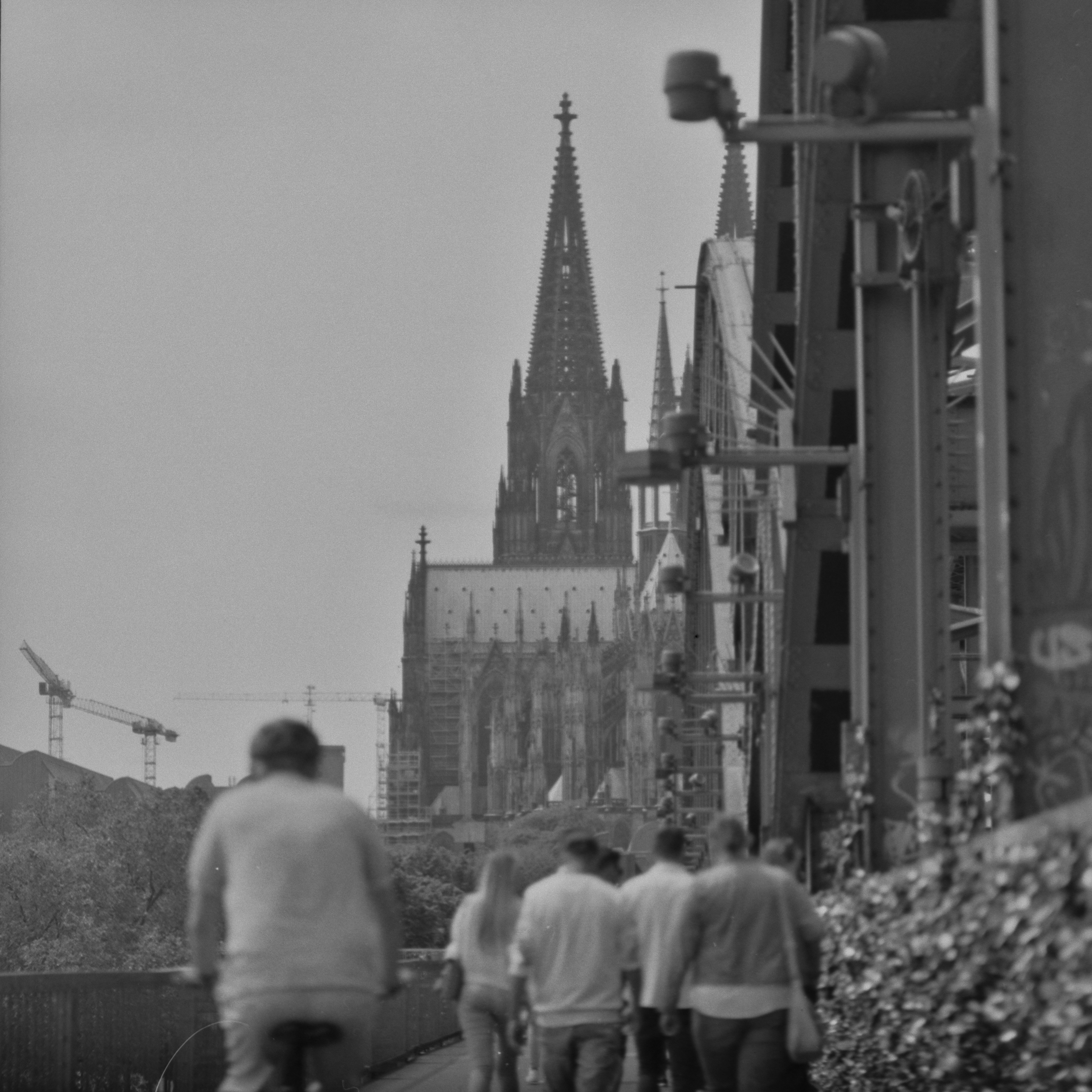 grayscale photo of people walking on street