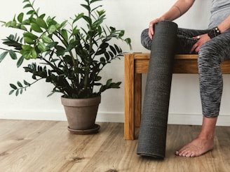 person sitting on gray chair