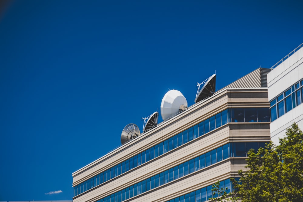 white and blue concrete building under blue sky during daytime