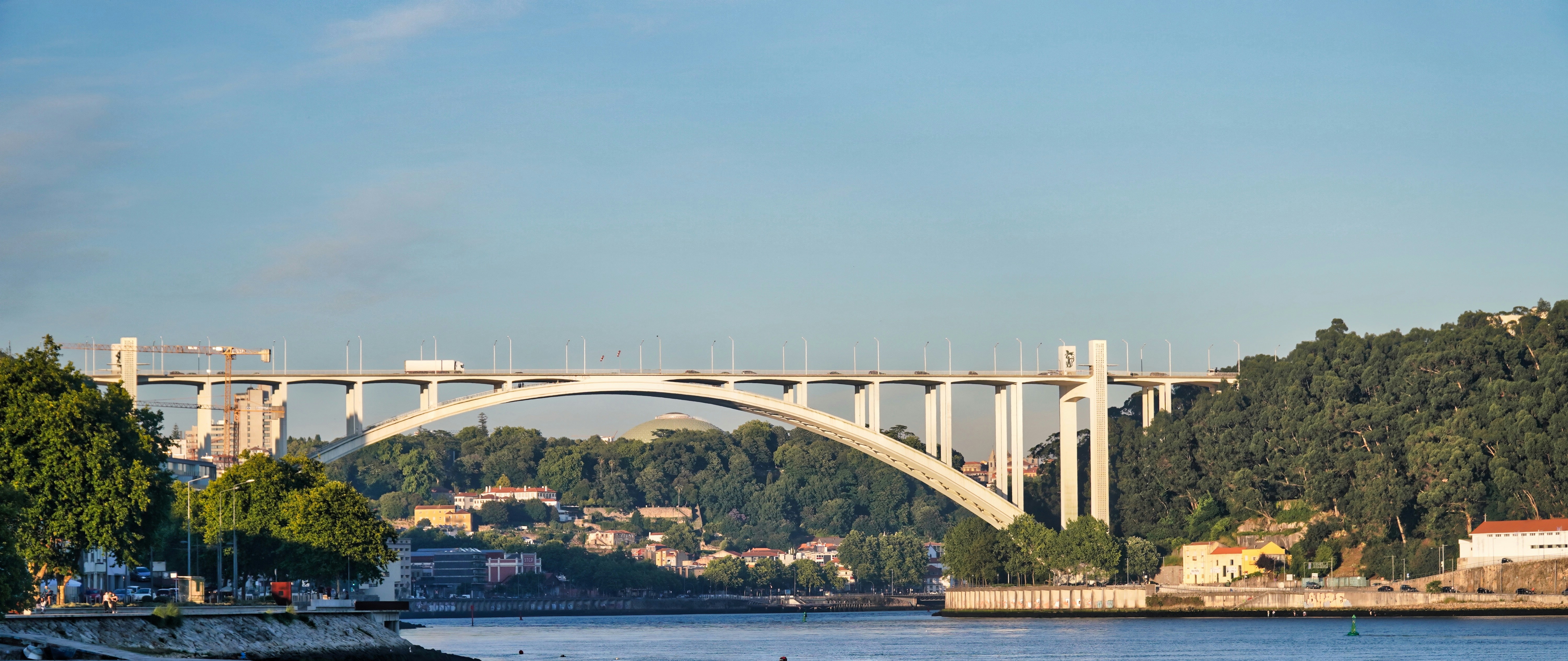 white bridge over the sea during daytime, 