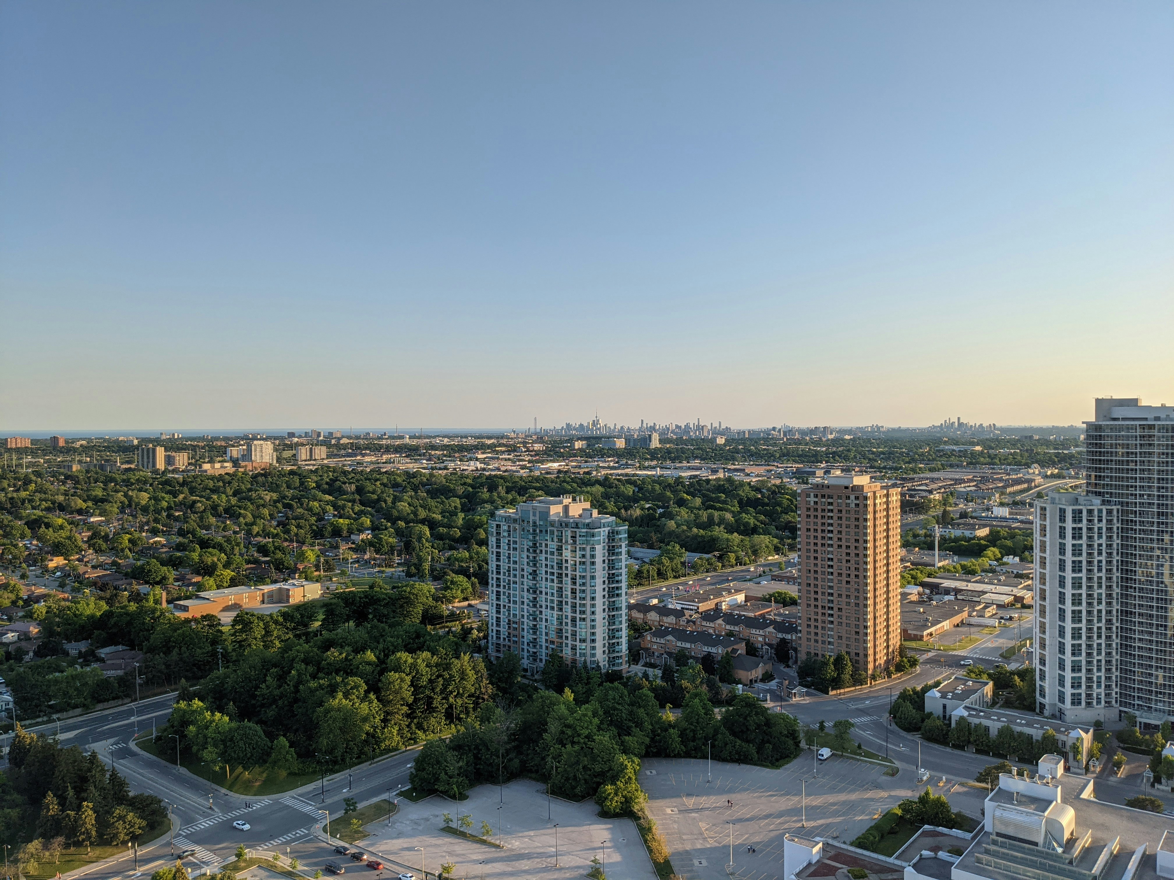 City buildings under blue sky during daytime photo – Free Building ...