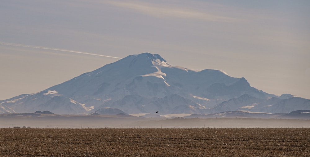 snow covered mountain during daytime