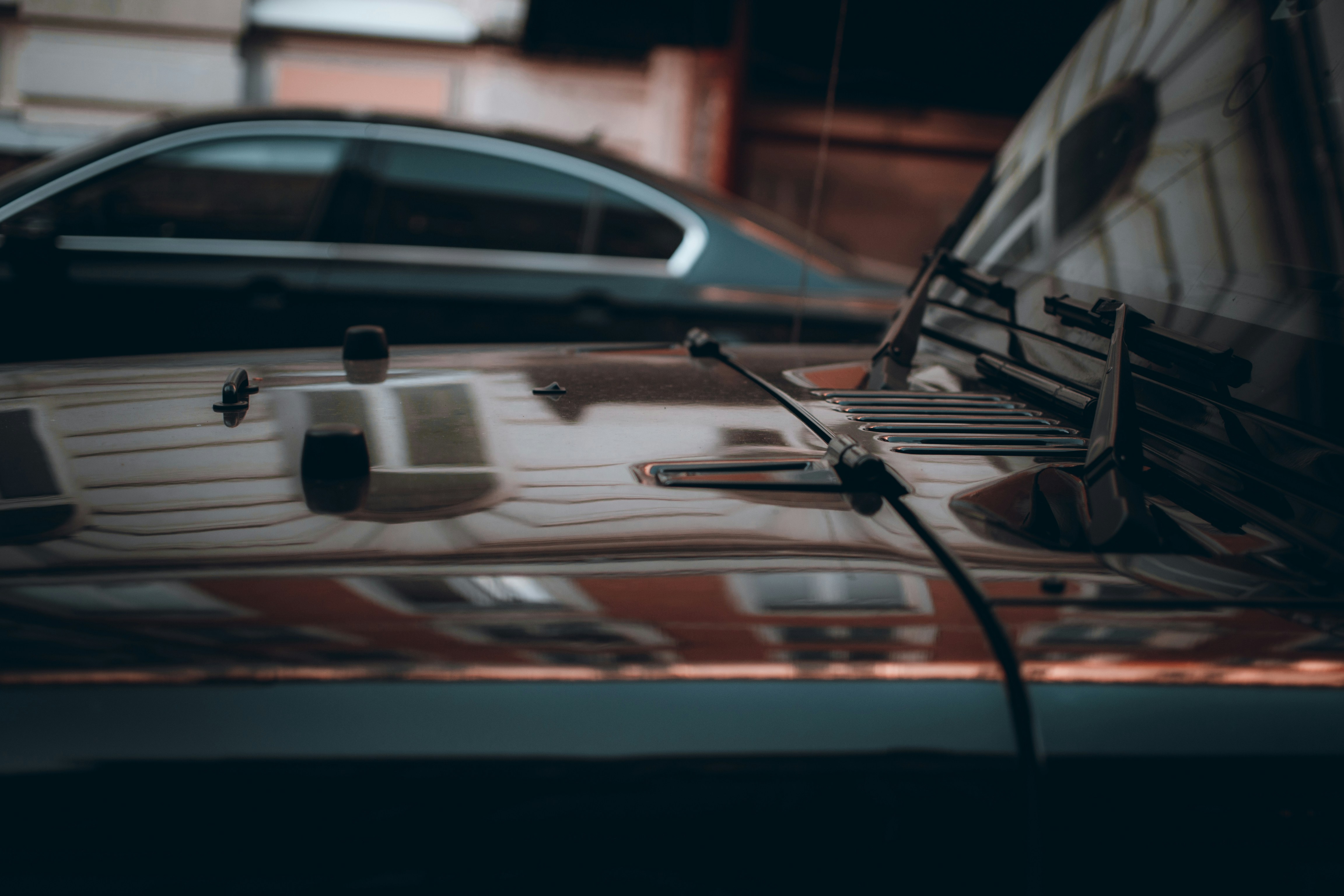 white and red car in a parking lot