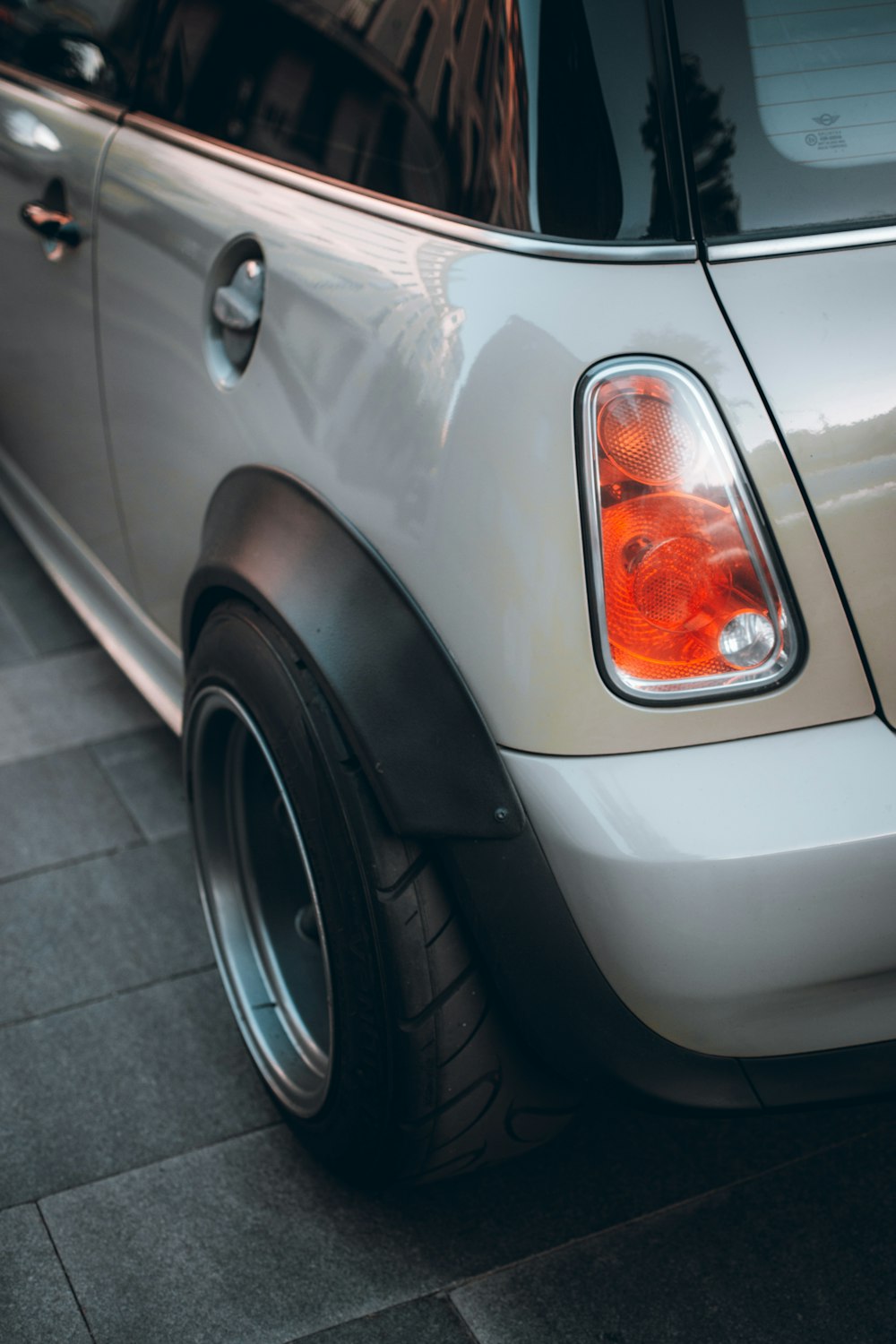 silver car with black wheel