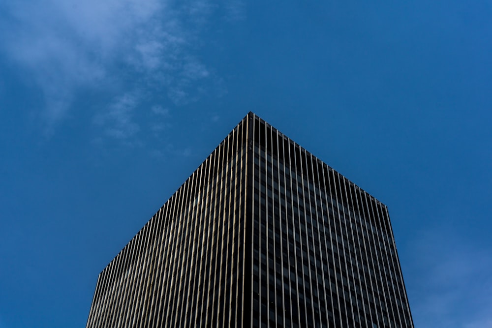 black and white concrete building under blue sky during daytime