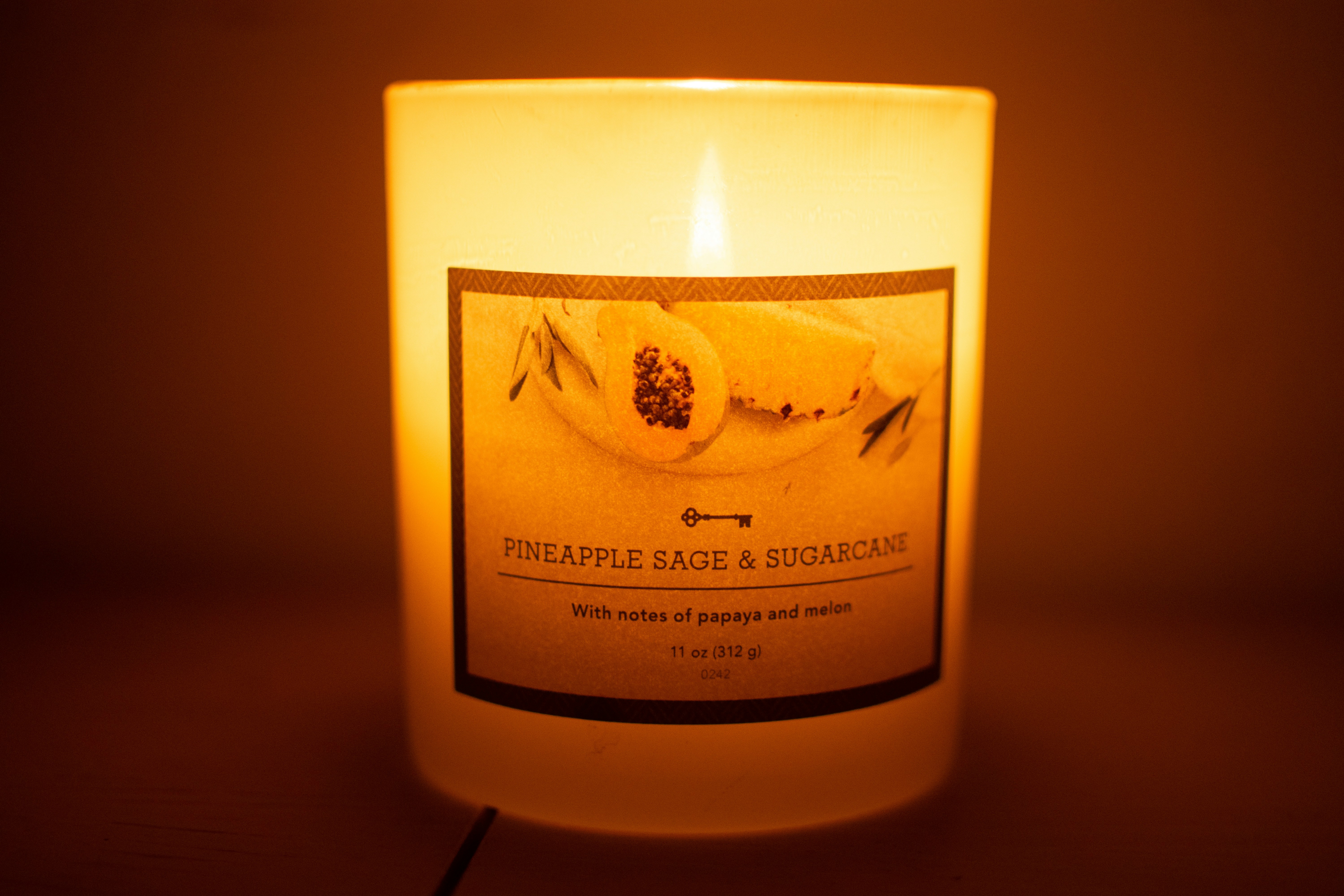 white and black labeled bottle