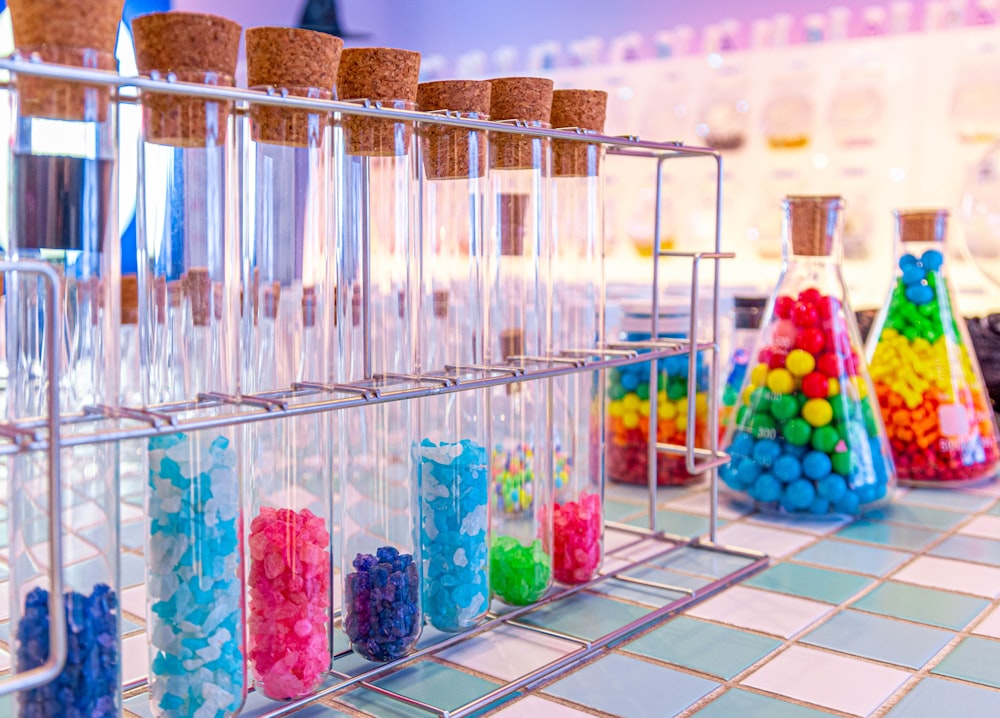 assorted color ice cream cone on white table