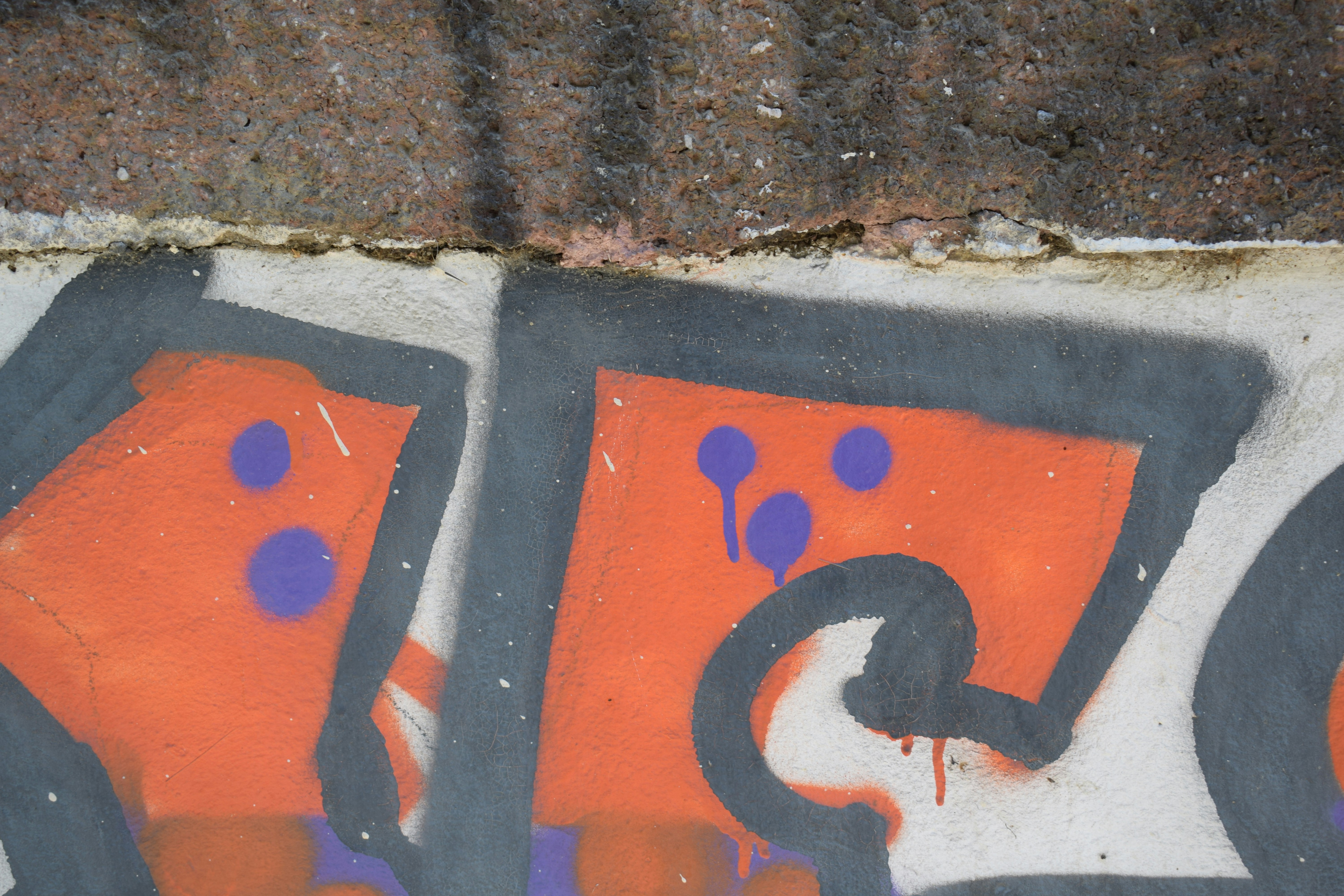 orange and black number 2 wall art