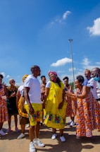 people gathering on beach during daytime
