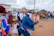 Security personnel discreetly monitoring a lively wedding reception in Guinea.