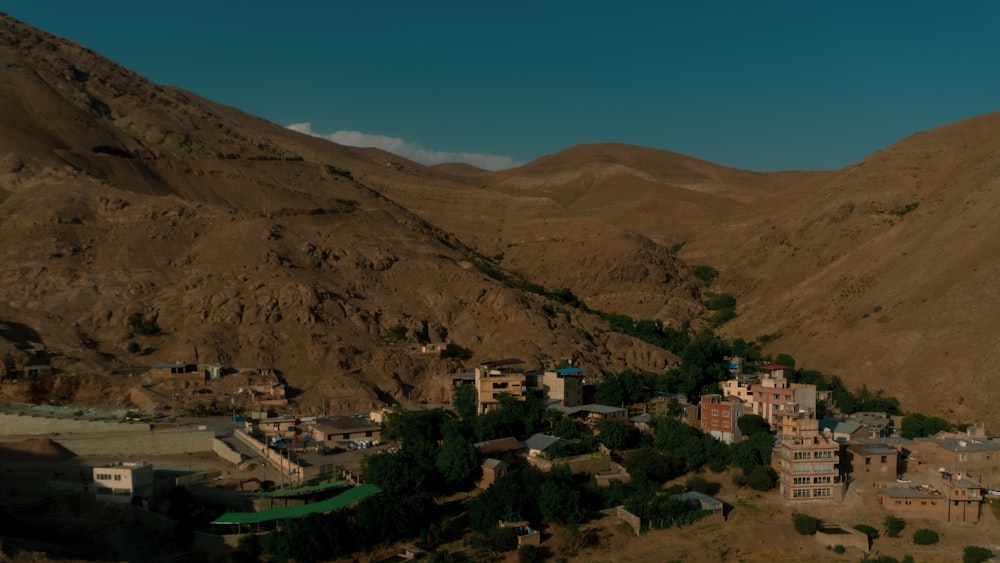 aerial view of city near mountain during daytime