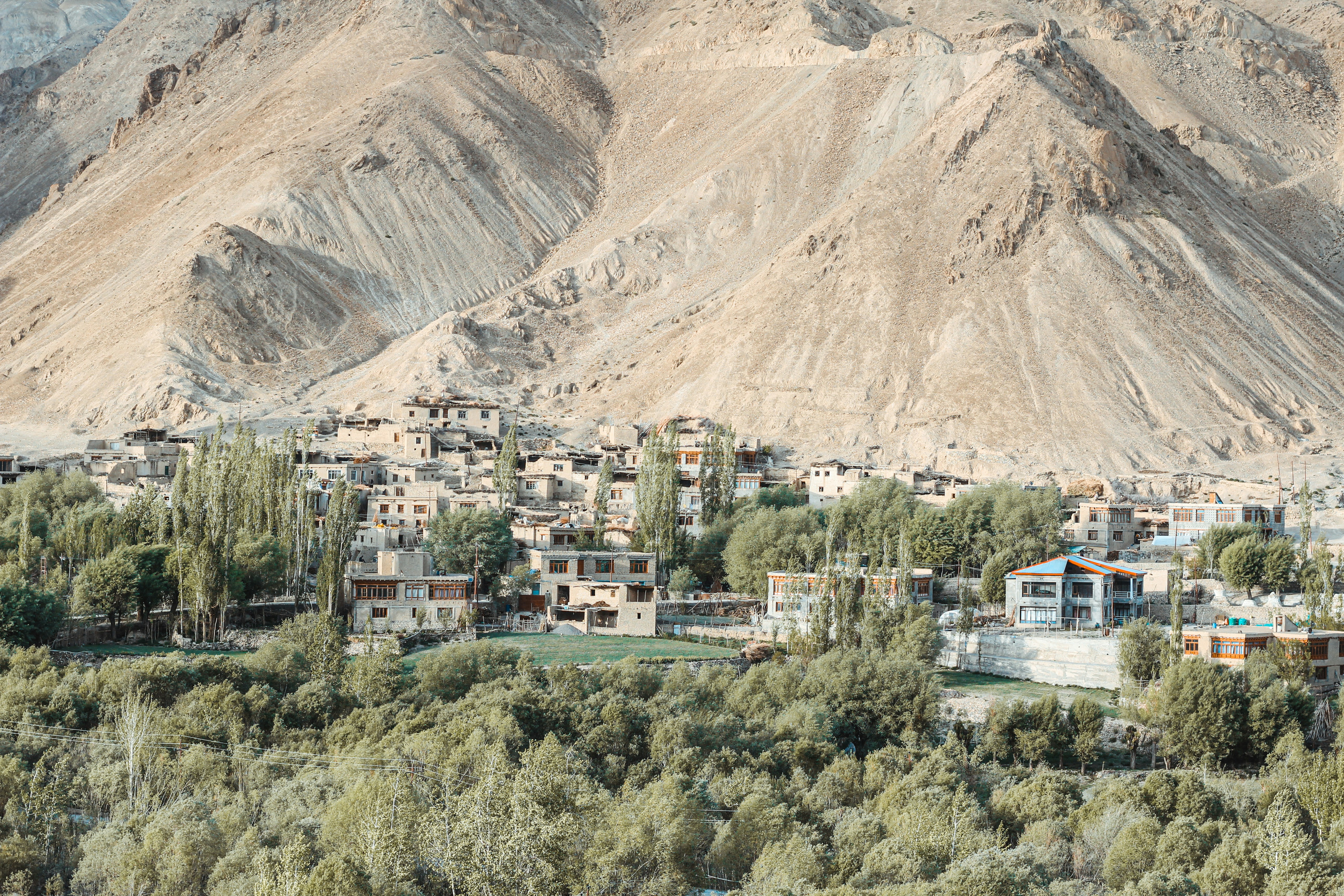 aerial view of city near mountain during daytime