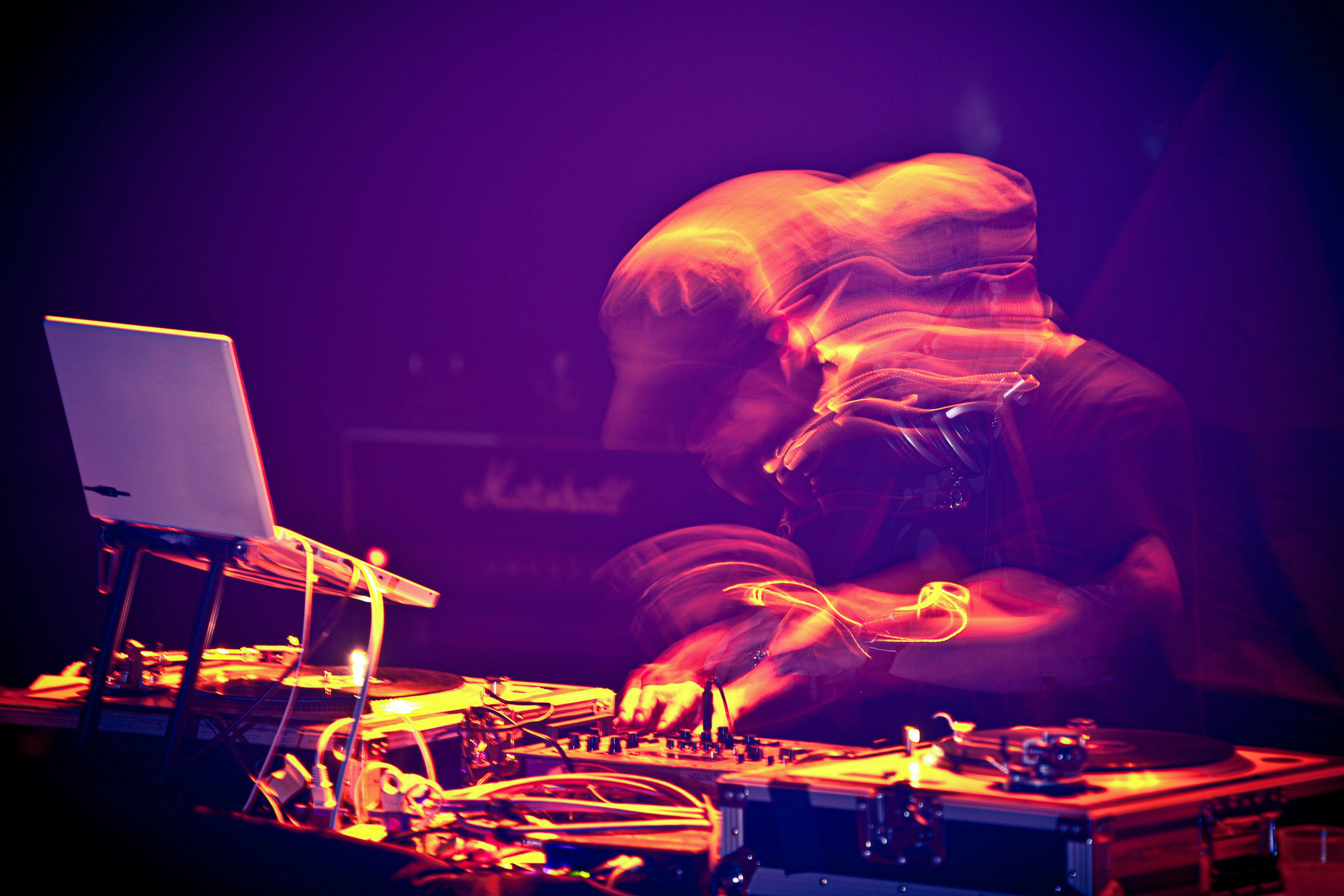 man playing guitar on stage