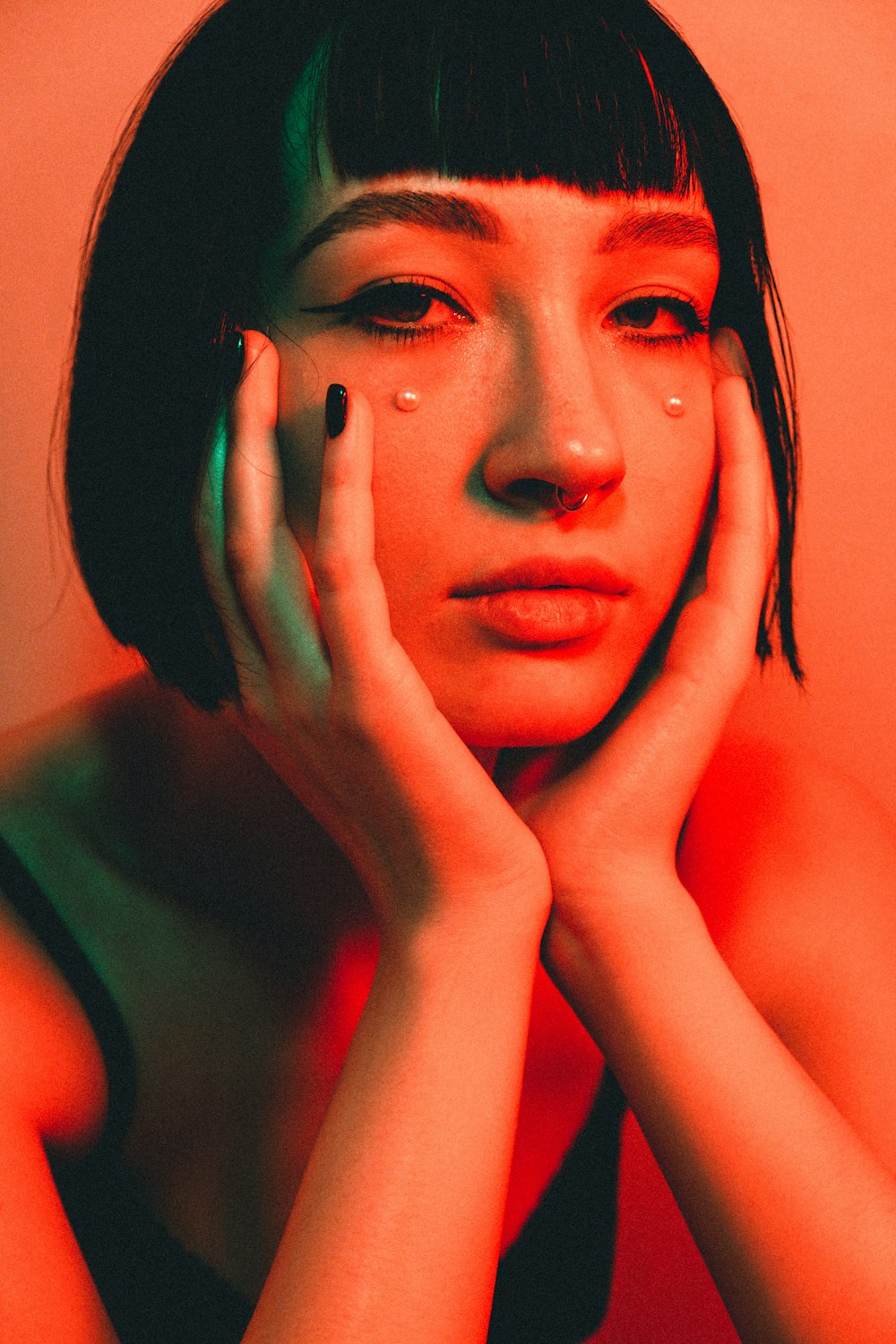 woman with black hair and red lipstick