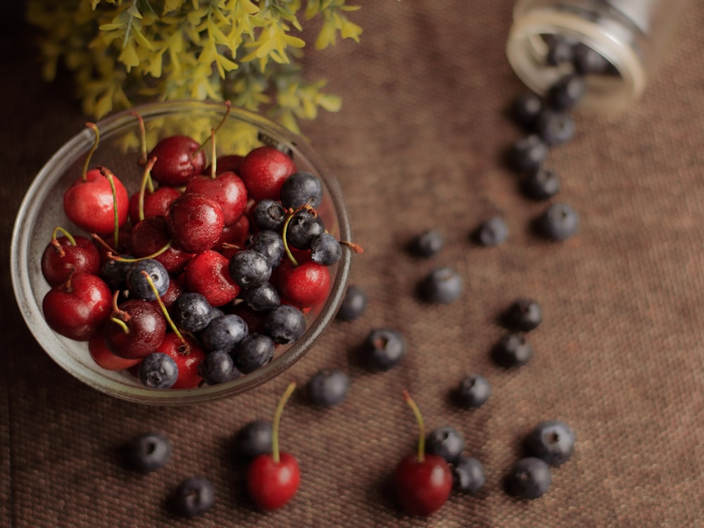 red berries on stainless steel bowl