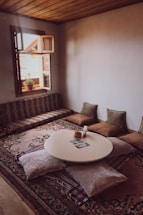 Cozy Persian-themed room with soft lighting and plush cushions inviting relaxation