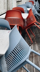 Close-up of durable stainless steel outdoor dining chairs with elegant design.