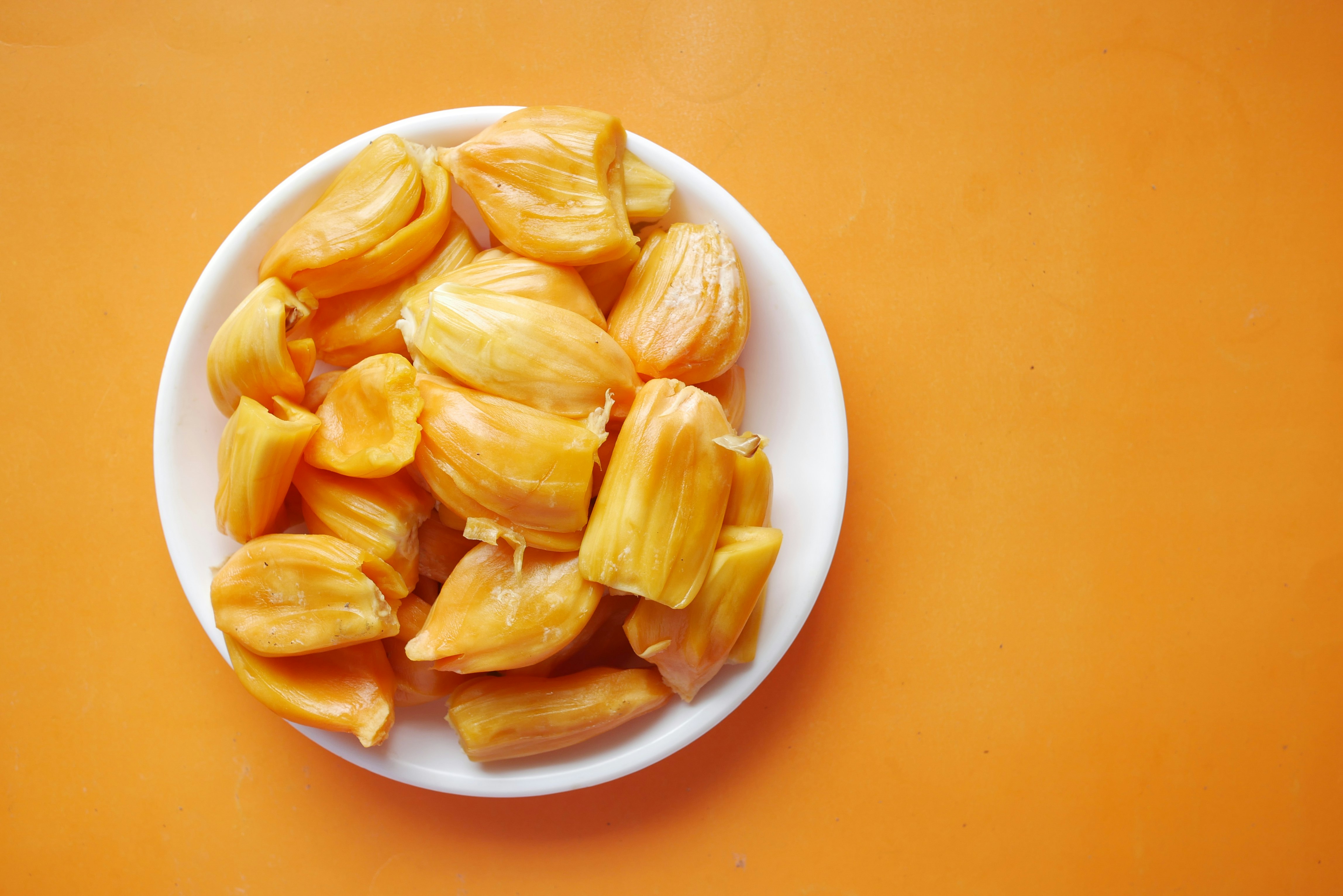 top view of slice of jackfruits in a bowl on table