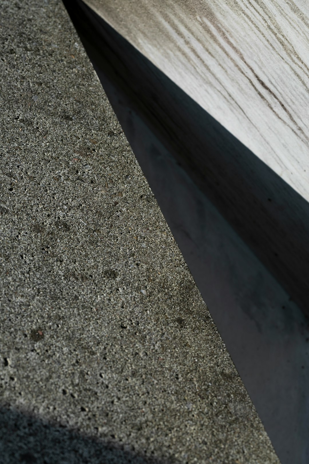 white wooden plank on gray concrete floor