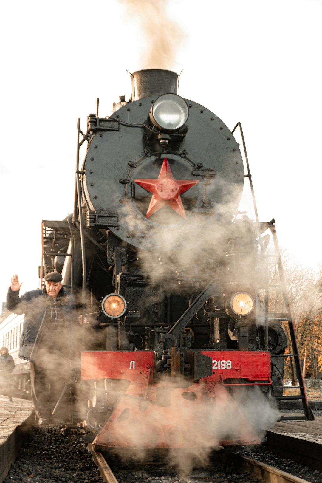 black and red steam train