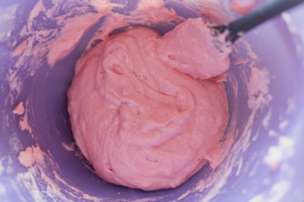 pink clay on blue ceramic bowl
