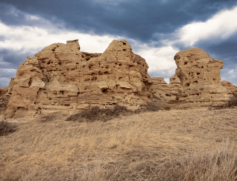 brown rock formation under blue sky during daytime