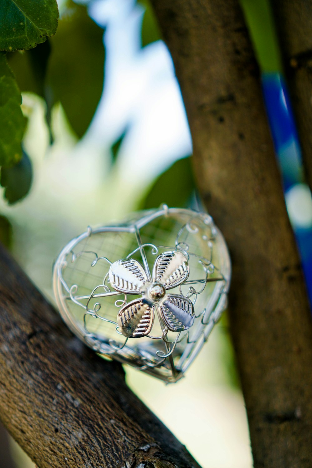 silver owl on tree branch