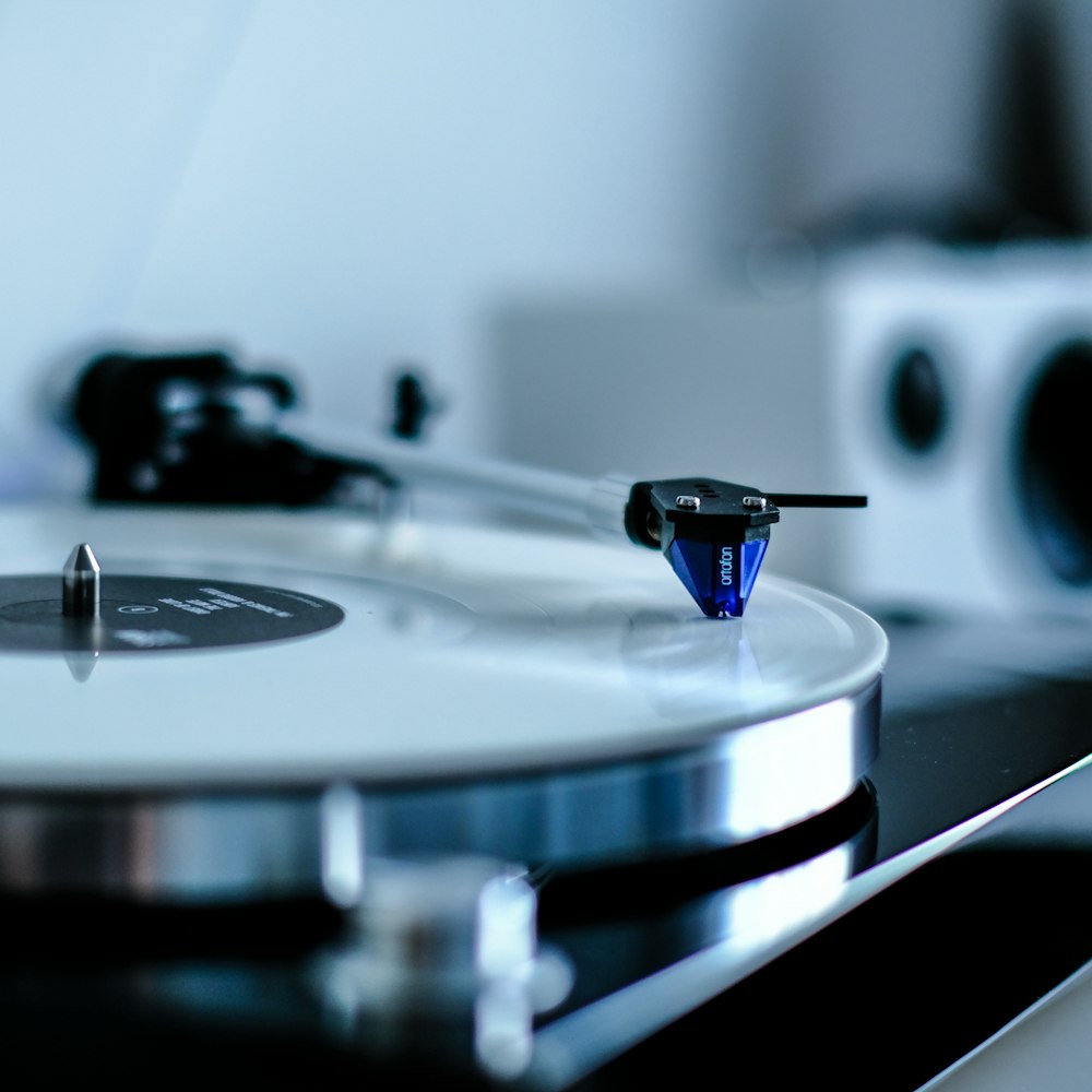 black and silver vinyl record player