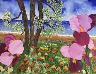 A vibrant landscape painting featuring tall trees with green foliage near a beach. Bright pink and purple flowers dominate the foreground with lush green grass and smaller orange and yellow flowers scattered throughout. The background showcases a sandy beach leading to a blue body of water under a cloudy sky.