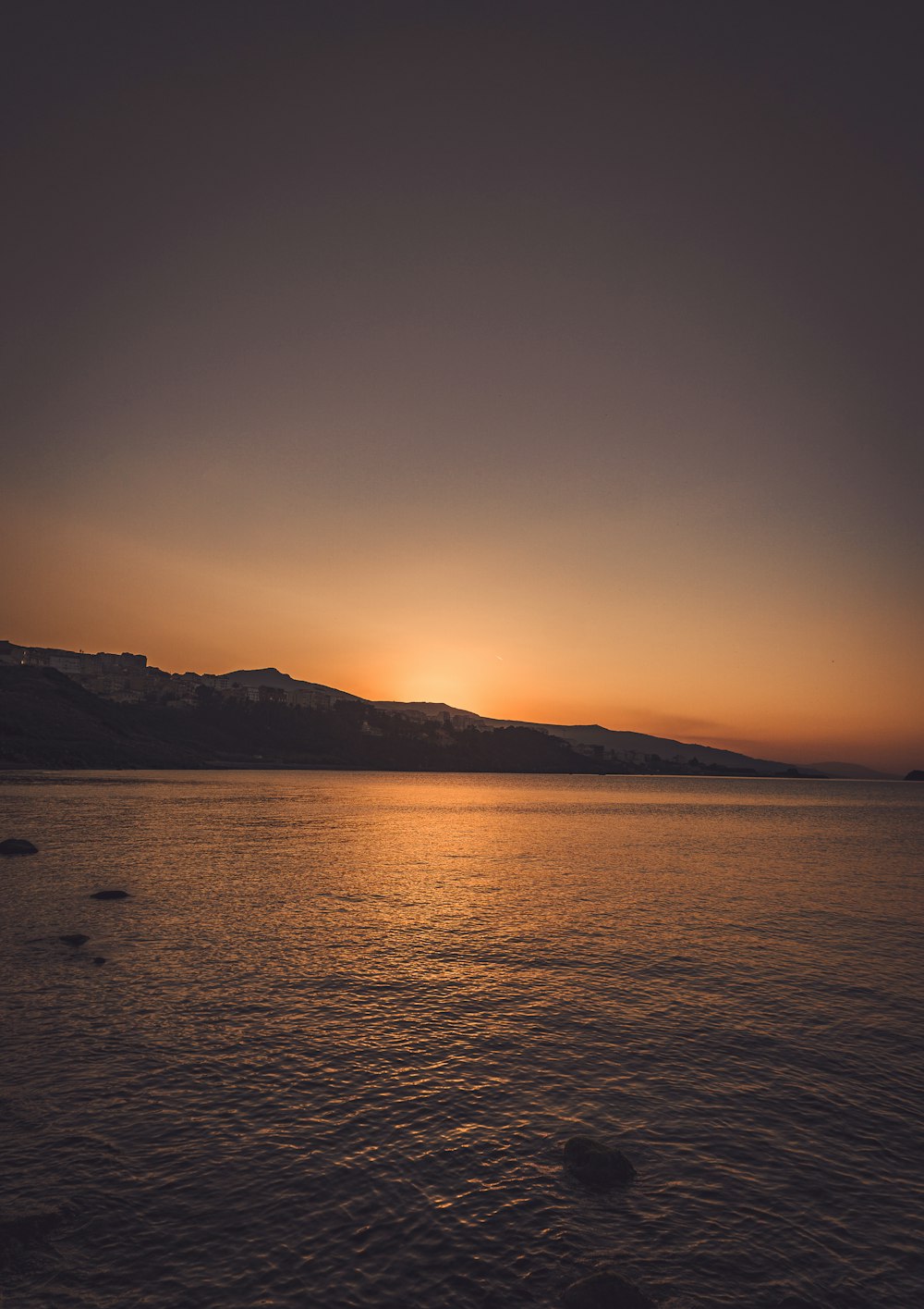 silhouette of mountain during sunset