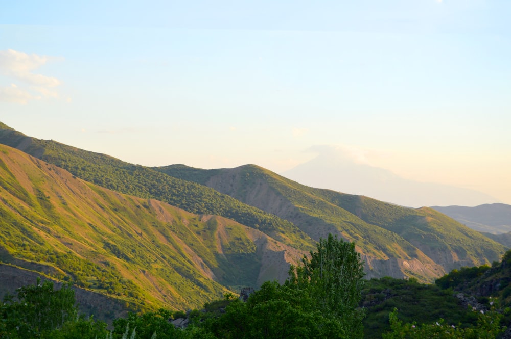 green mountain under white sky during daytime