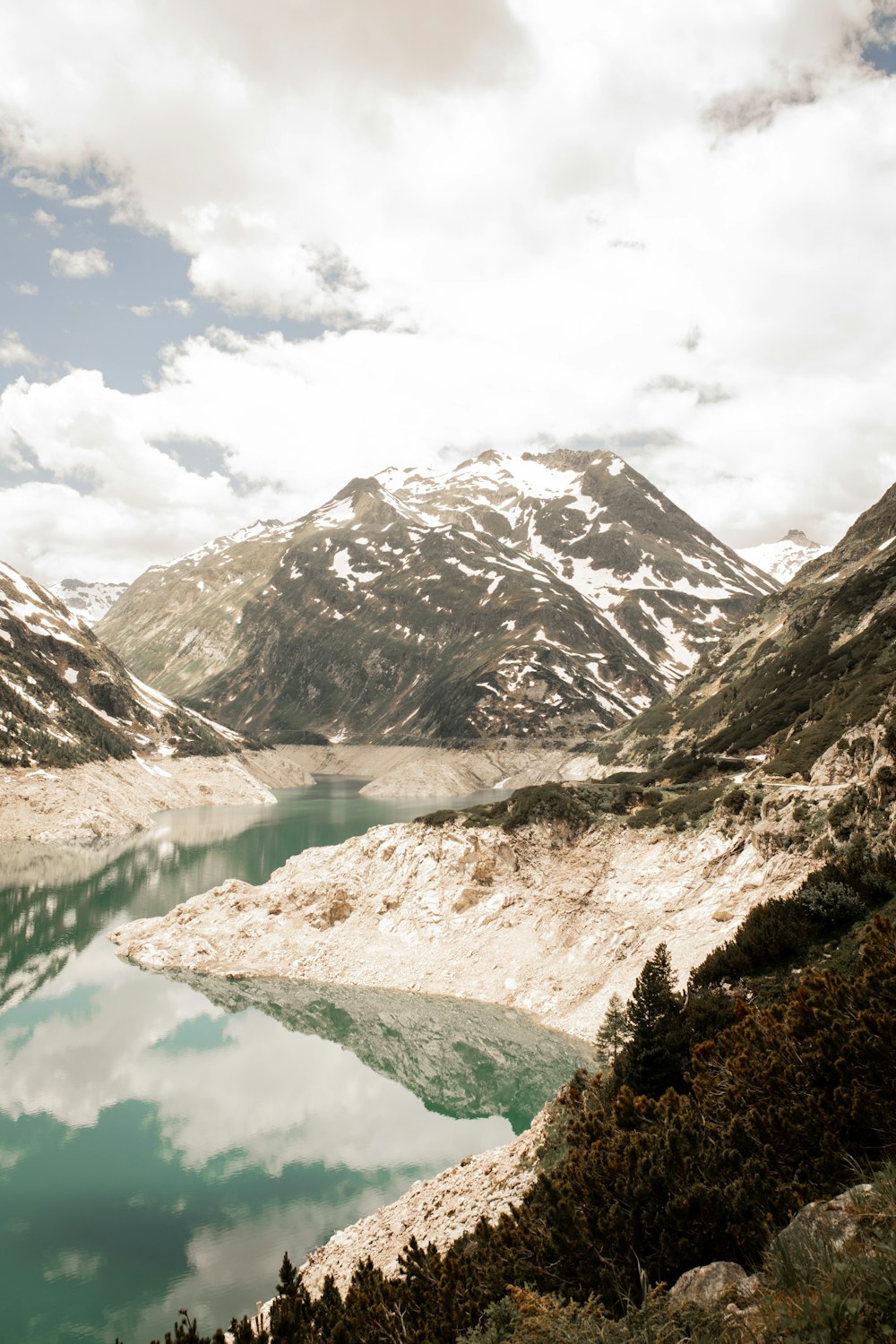 lake in the middle of mountains