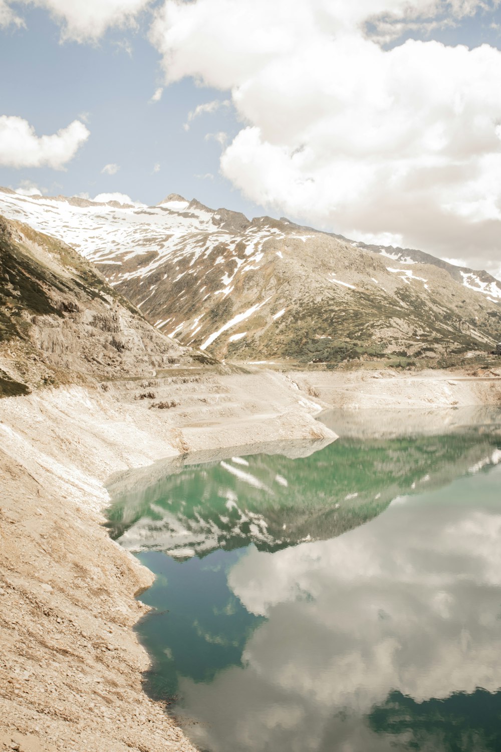 lake in the middle of mountains