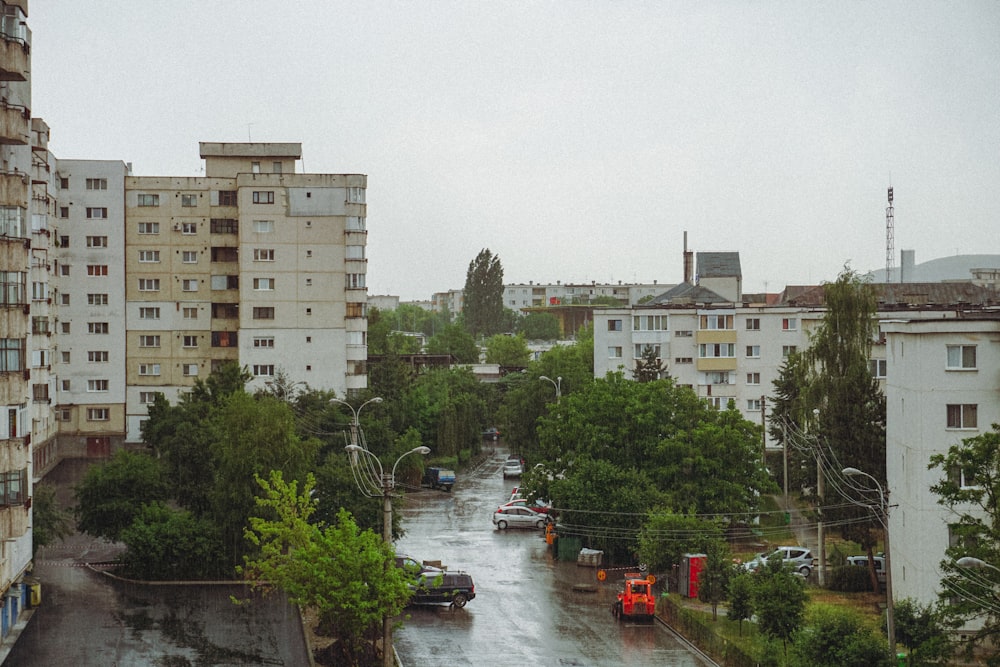 white and brown concrete building near river during daytime