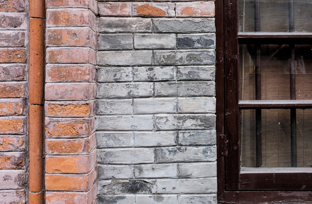 brown wooden framed glass window