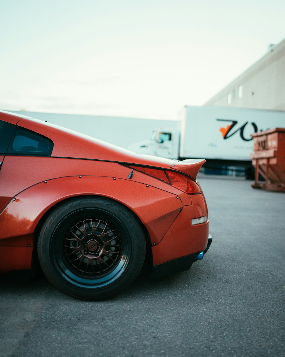 red ferrari 458 italia on gray concrete floor